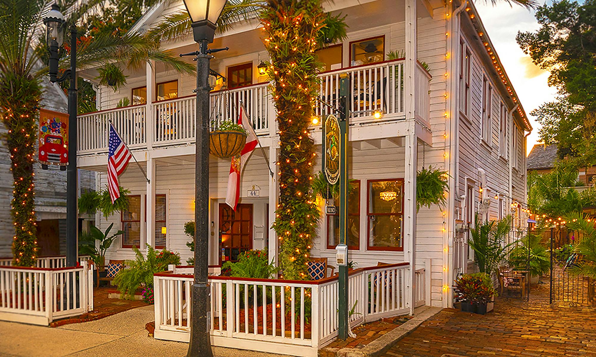 44 Spanish Street Inn illuminated at dusk